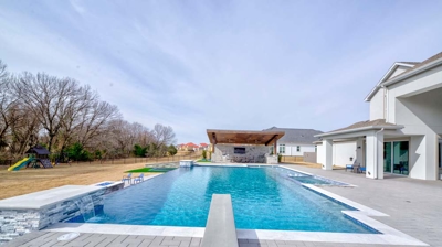 Pool with diving board Photo