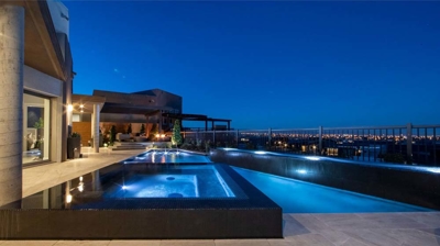 Spa and pool illuminated at night Photo