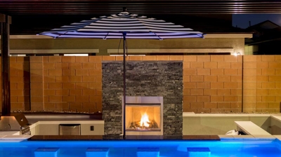 Swim up bar with outdoor fireplace Photo