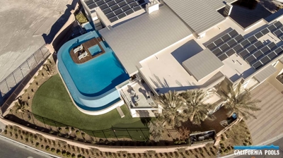 Custom infinity edge pool with rounded corners from above Photo