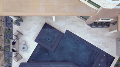 Angular pool and spa combination from above Photo