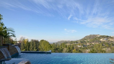 Custom infinity edge pool with waterfalls Photo