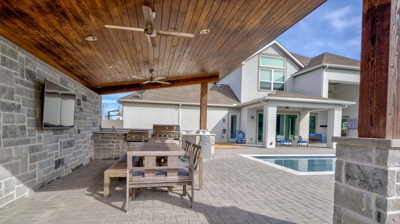 Covered outdoor bar and pool Photo