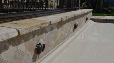 Closed pool cover with water feature Photo