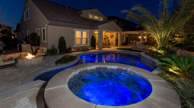 Illuminated round spa at night Photo