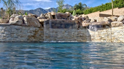 Stone waterfalls and custom pool Photo