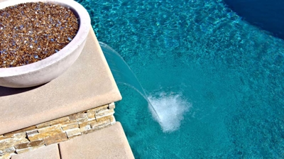 Custom stone waterfall and fire bowl Photo