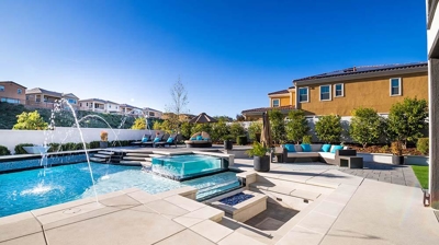 Custom patio and pool with deck jets Photo