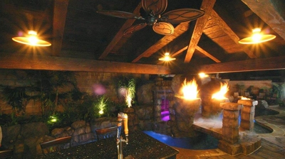 Island paradise-inspired outdoor kitchen and bar zone. Photo