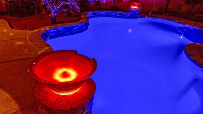 Pool with a view of bucket of water design of waterfall. Photo