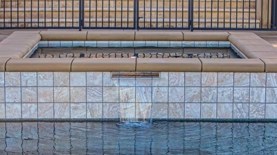 Small waterfall flowing into pool. Photo