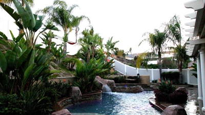 Outdoor pool with beautiful stone flooring. Photo