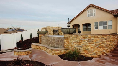 Beautiful outdoor jacuzzi with stone work. Photo