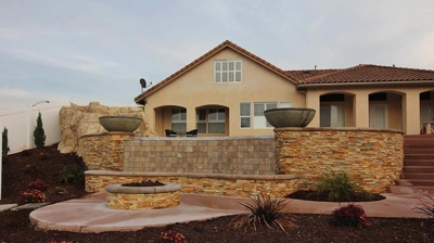 Beautiful outdoor jacuzzi with stone work. Photo