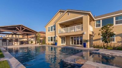 Serene outdoor sanctuary: pool, spa, lounge chairs, and mesmerizing views. Photo