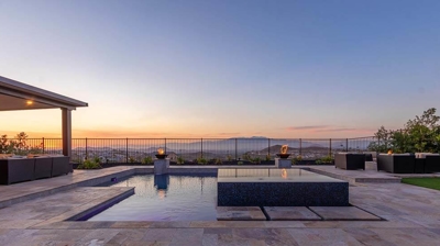 Outdoor backyard with pool and sunset Photo