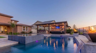 Outdoor backyard with pool and sunset Photo