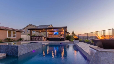 Outdoor backyard with pool and sunset Photo