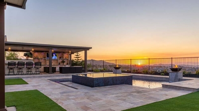 Outdoor backyard with pool and sunset Photo