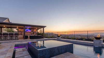 Imagine lounging by the pool, surrounded by beautiful landscaping, while enjoying a breathtaking view. Photo
