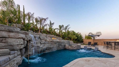 Waterfall pool during daytime. Photo
