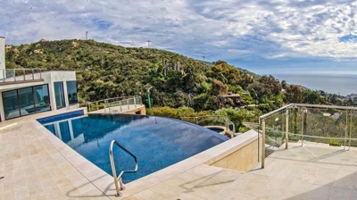 Outdoor pool with gorgeous view in background. Photo