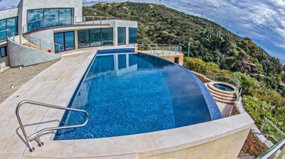 Outdoor pool with gorgeous view in background. Photo
