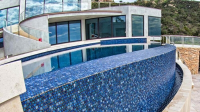 Side of outdoor pool design. Photo