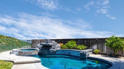 Pool with Spa and Waterfall Photo
