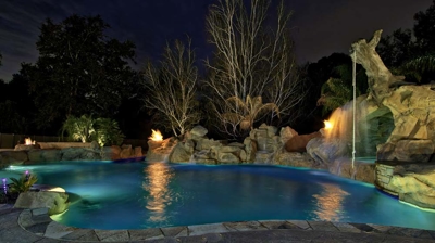 Custom freeform pool at night Photo