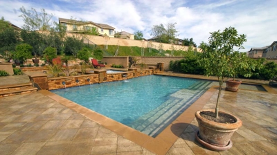 View of backyard pool and patio Photo