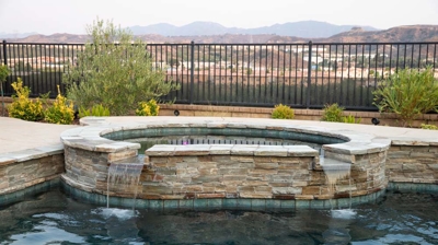 Custom spa design with spillovers Photo