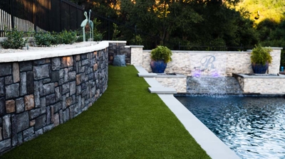 Backyard pool and patio area Photo