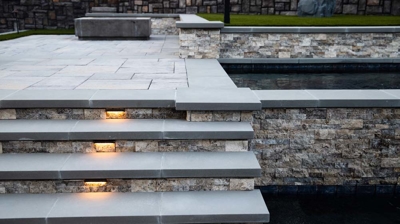 Illuminated poolside stairs Photo