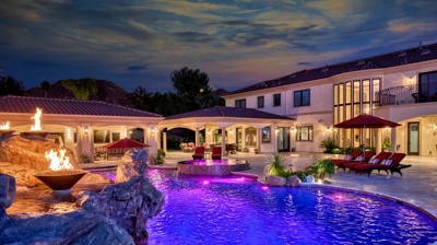 Pool with fire bowl features Photo