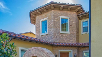 Home Exterior with Brick Archway - Alternate View Photo