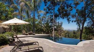 Outdoor Seating near Infinity Edge Pool Photo