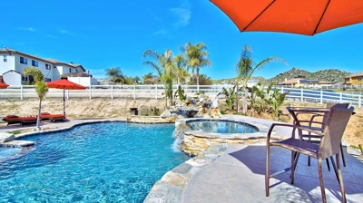 Pool with Outdoor Seating Photo
