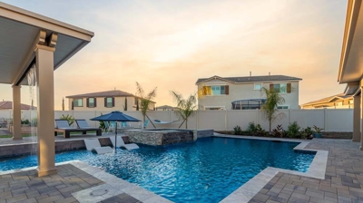 Outdoor blue pool during the morning light Photo