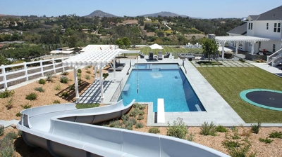 View from waterslide overlooking pool Photo