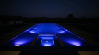 Stylish outdoor aquatic sanctuary with luminous touches. Photo