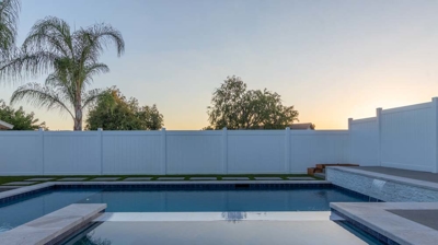 Custom spa and swimming pool at sunset Photo