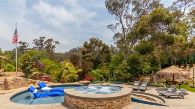 Backyard with custom freeform pool and spa Photo