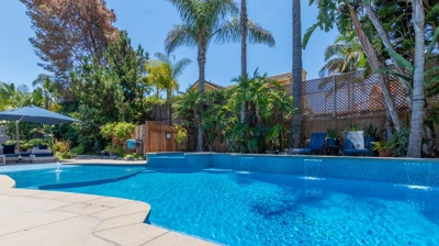 View of swimming pool from patio Photo
