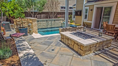 Stone design walls with jacuzzi and fireplace Photo