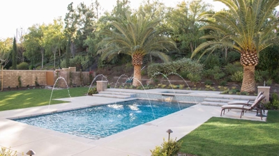 Outdoor pool with attached spa Photo