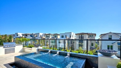 A rooftop with a modern spa. Photo