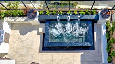 Top view of a sunlit terrace spa experience on a contemporary patio. Photo