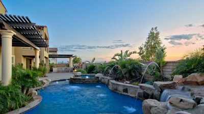 Backyard pool at dusk Photo