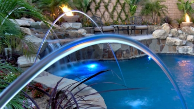 Backyard pool with fountain features Photo